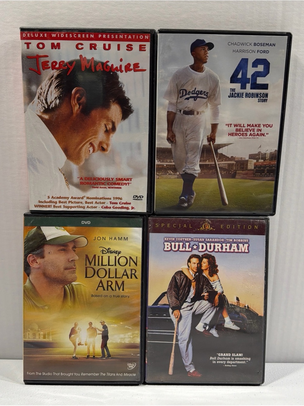 Four Classic Movie DVDs - Jerry Maguire, 42, Million Dollar Arm, Bull Durham